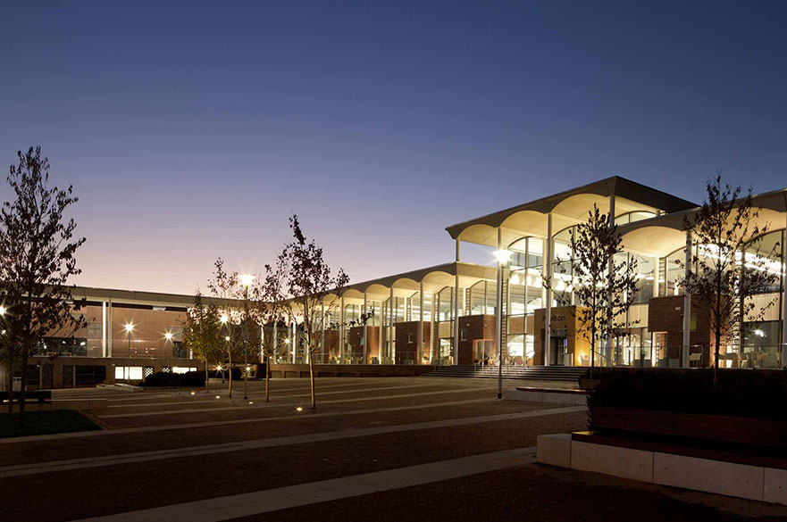School building lit up at night