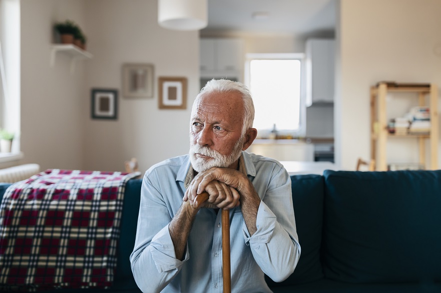 Senior gentleman sitting alone