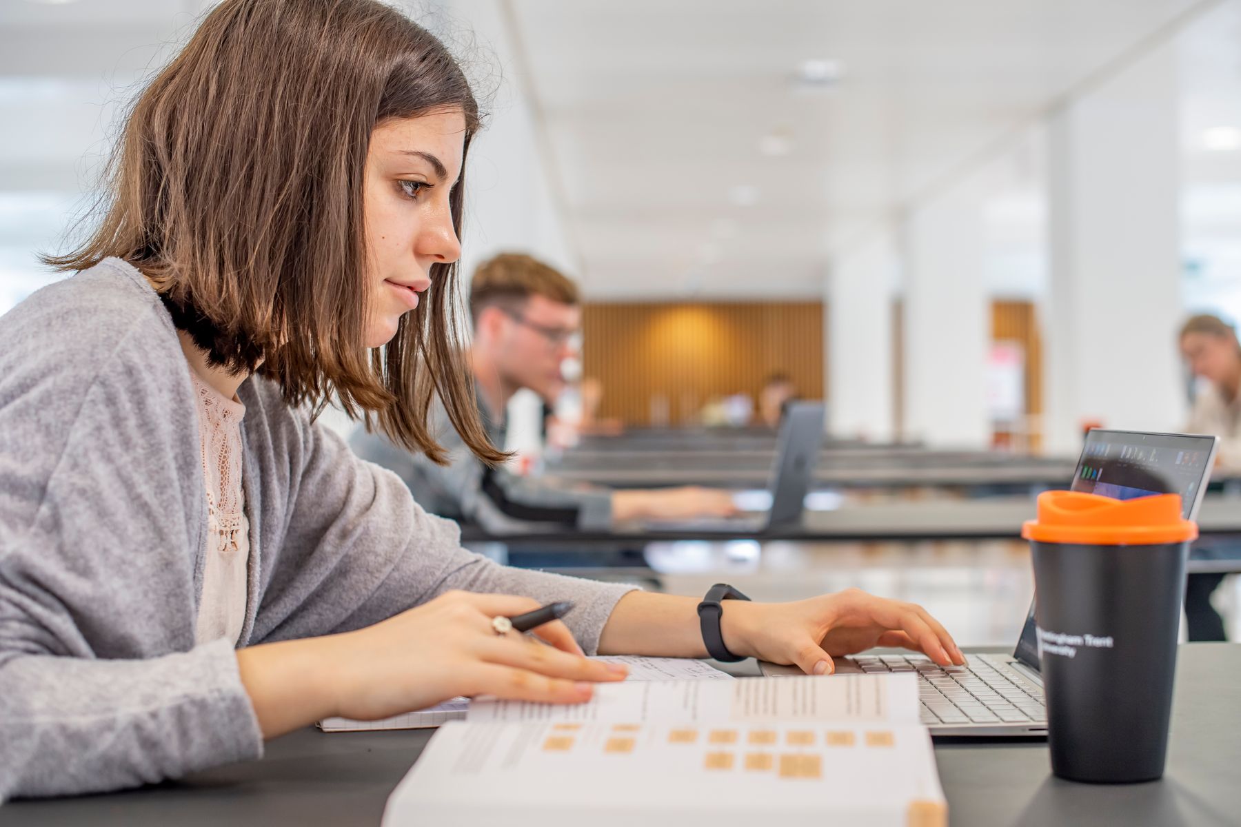 Student studying in Newton Building