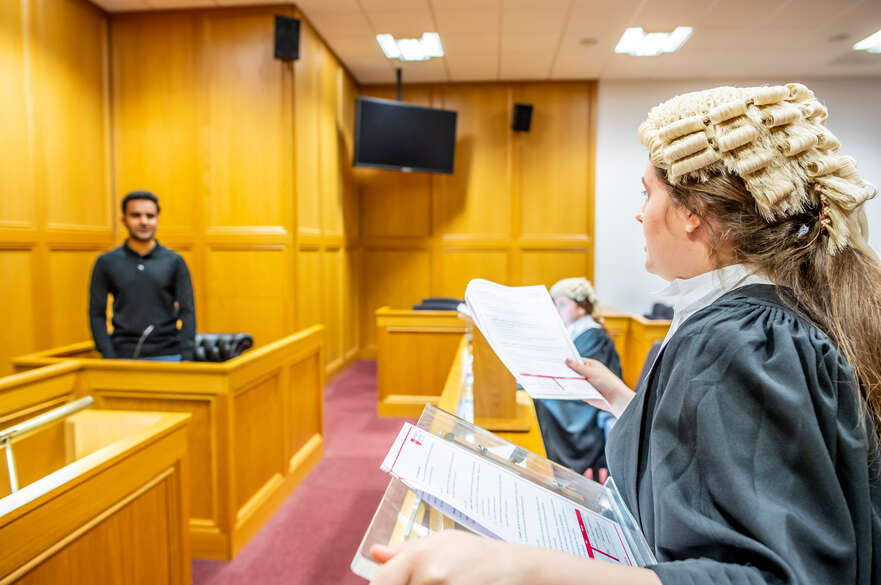 Students performing in courtroom