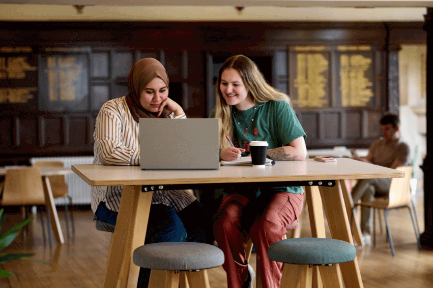 Students working on their laptop in Main Hall