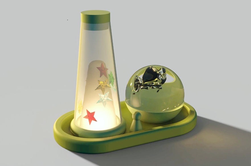 A tray with two items on it - a tall cone-shaped therapeutic lamp with stars in it next to a clear round object containing a deflated balloon.