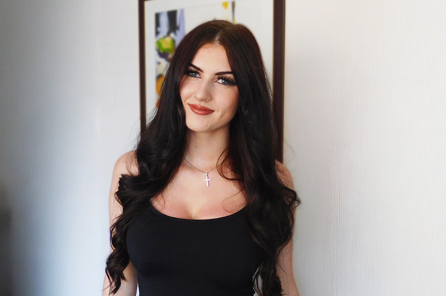 Anna smiling to the camera