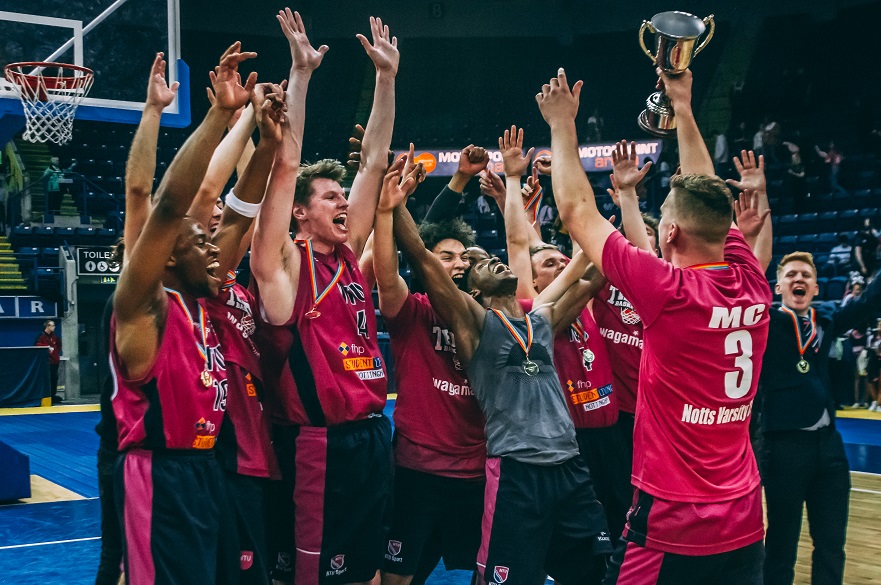 Men's basketball celebrating