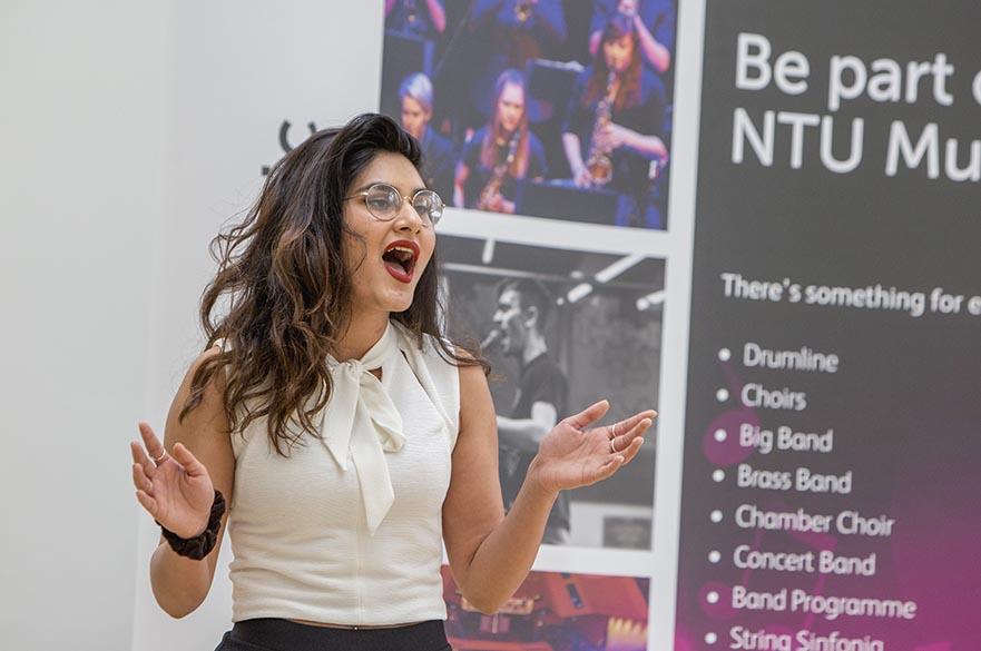 Female student singing.