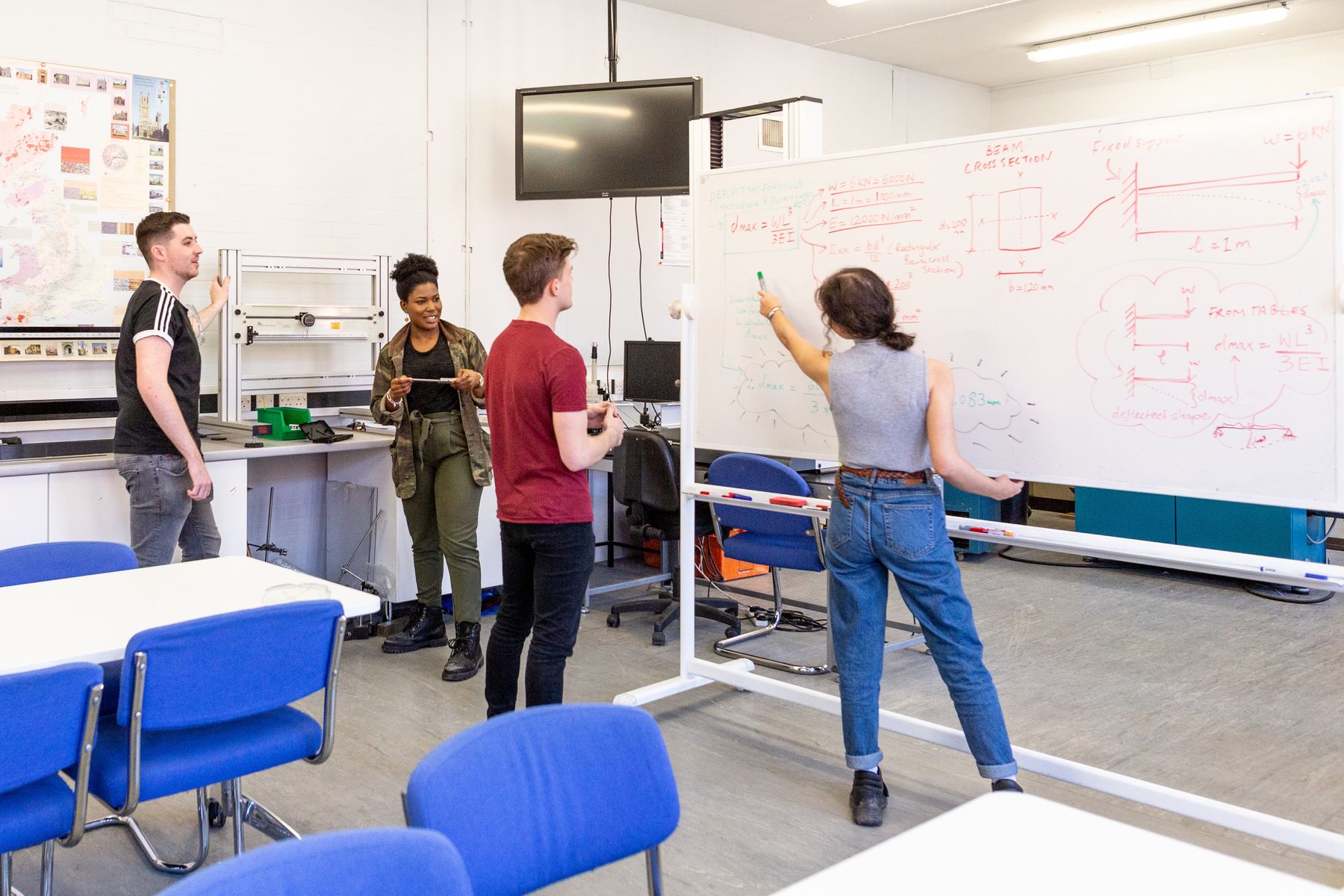 Students working in the materials testing and light structures laboratory, Maudslay workshops