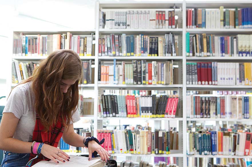 Student reading book