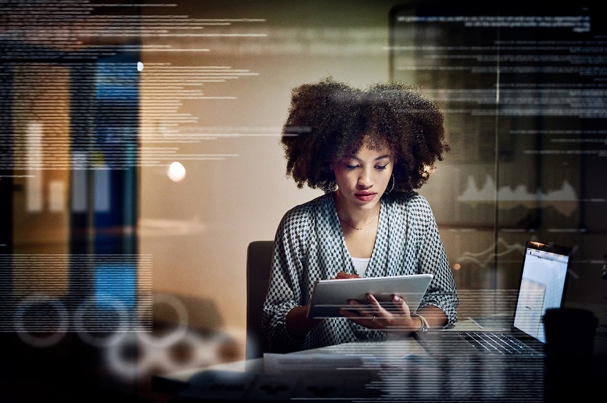 Lady sat by a computer