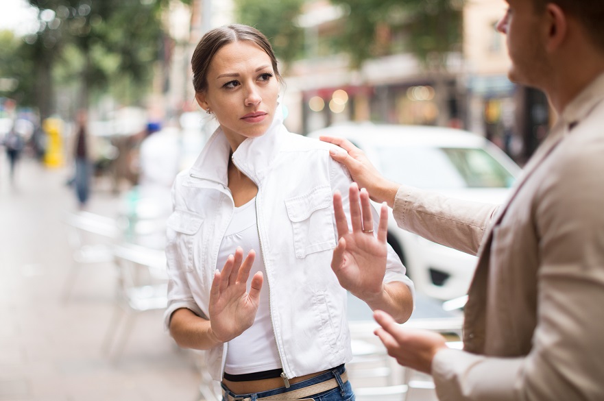 Women and man in a street