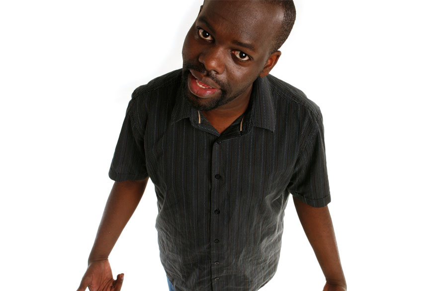 A photo of a man wearing a black shirt, taken from above.