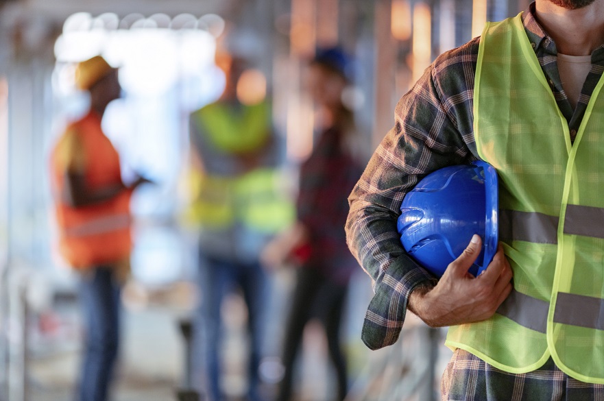 Man holding a hard hat