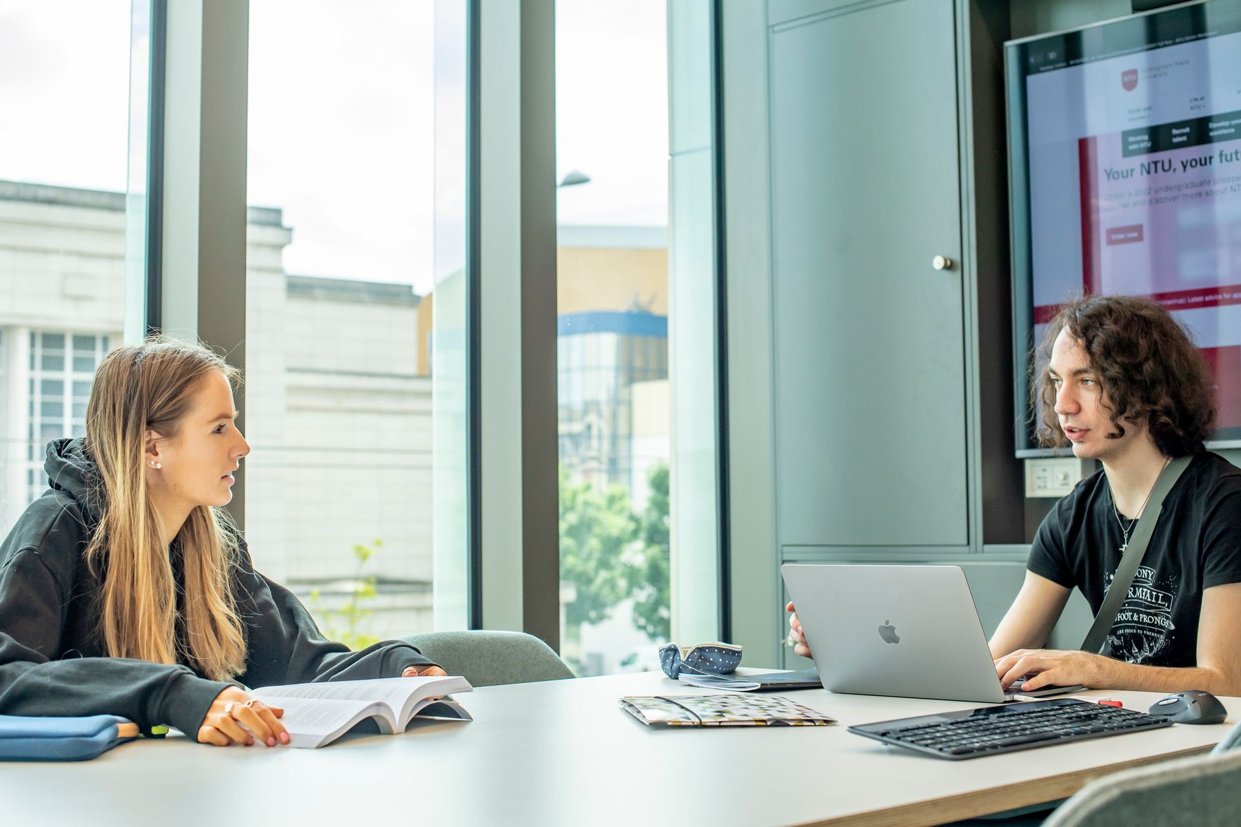 Students working in meeting room