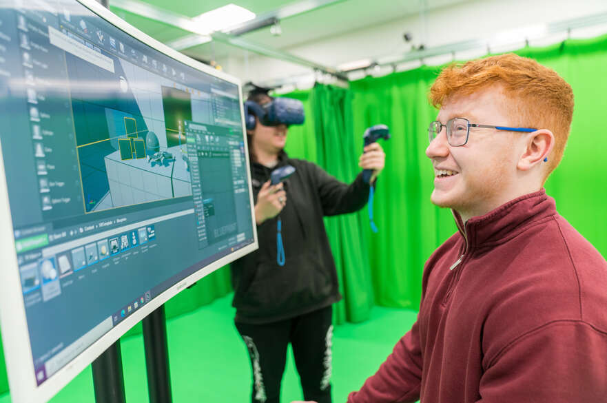 Student working in computer science VR lab