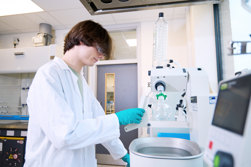 Image of male student in lab