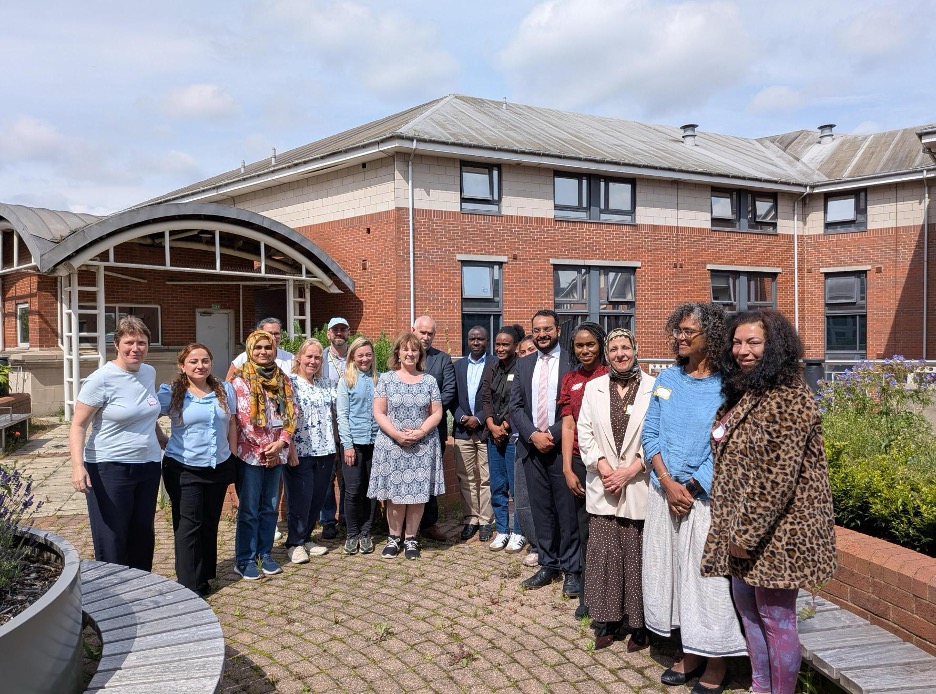 Group photo of the researchers, practitioners, community representatives and students who attended the workshop