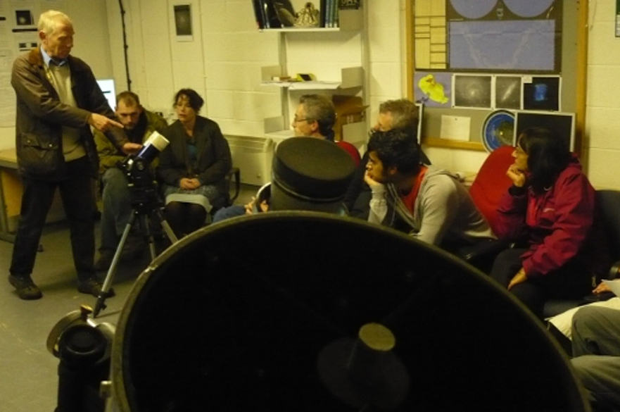 Open Dome Visitors talking about telescopes