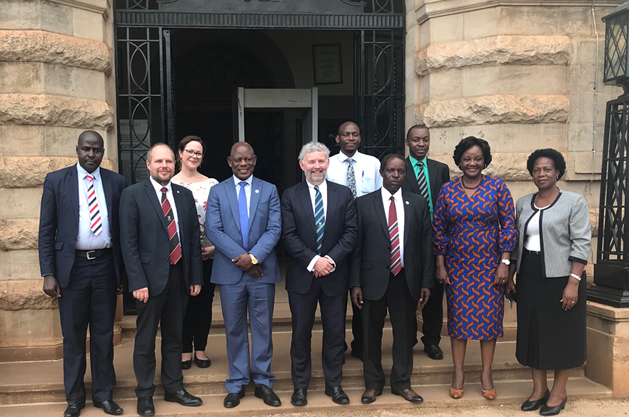 NTU and Makerere staff in front of the main university building