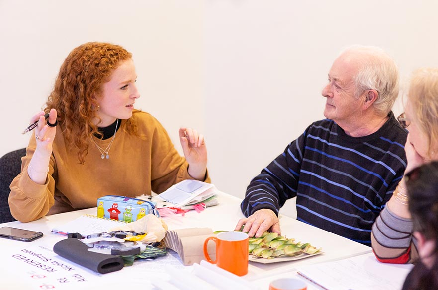 Students and My Sight service users discussing the design concepts
