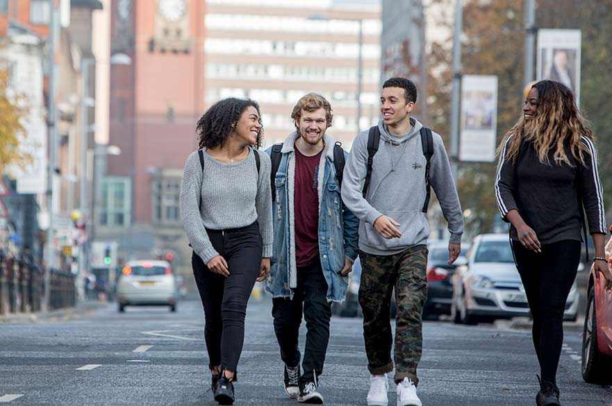 Students walking down street