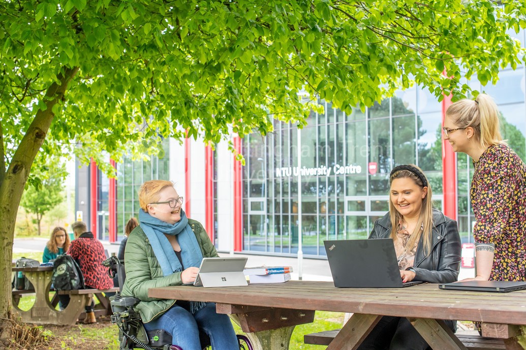 Students sat outside studying