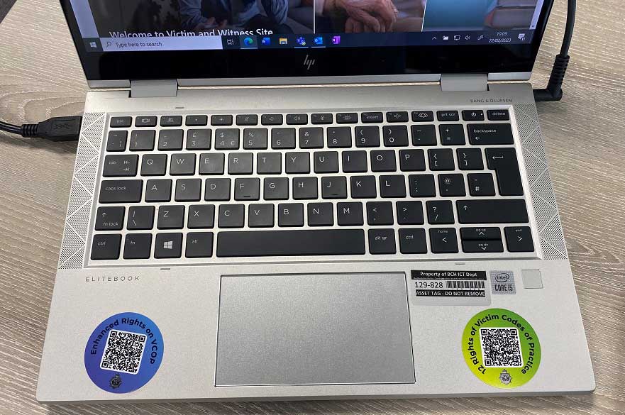 QR code stickers on a laptop