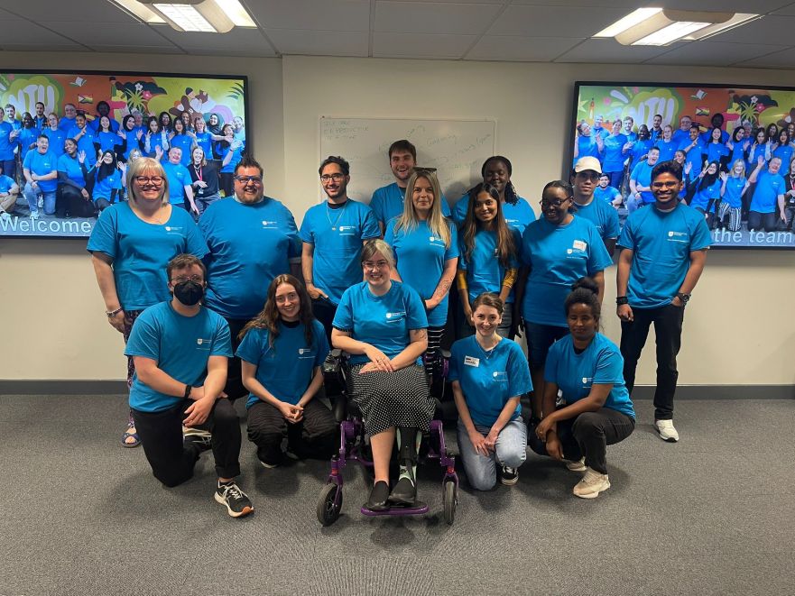A group photo of mature student ambassadors in their blue t-shirts.