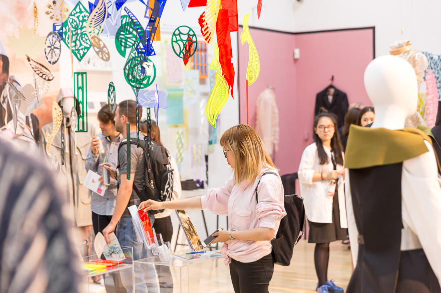 Visitors looking at exhibition