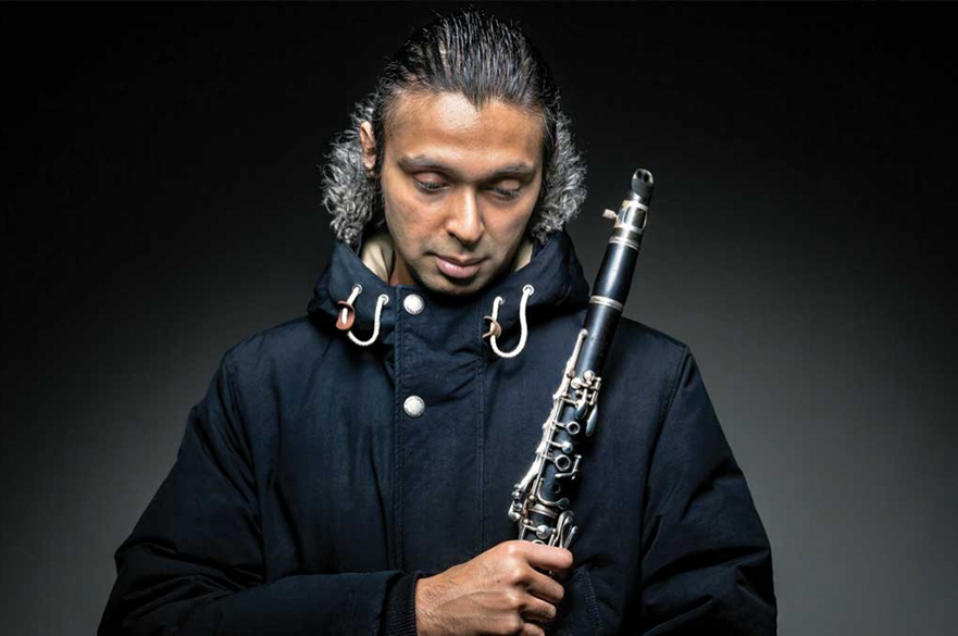 Arun Ghosh stood with his clarinet.