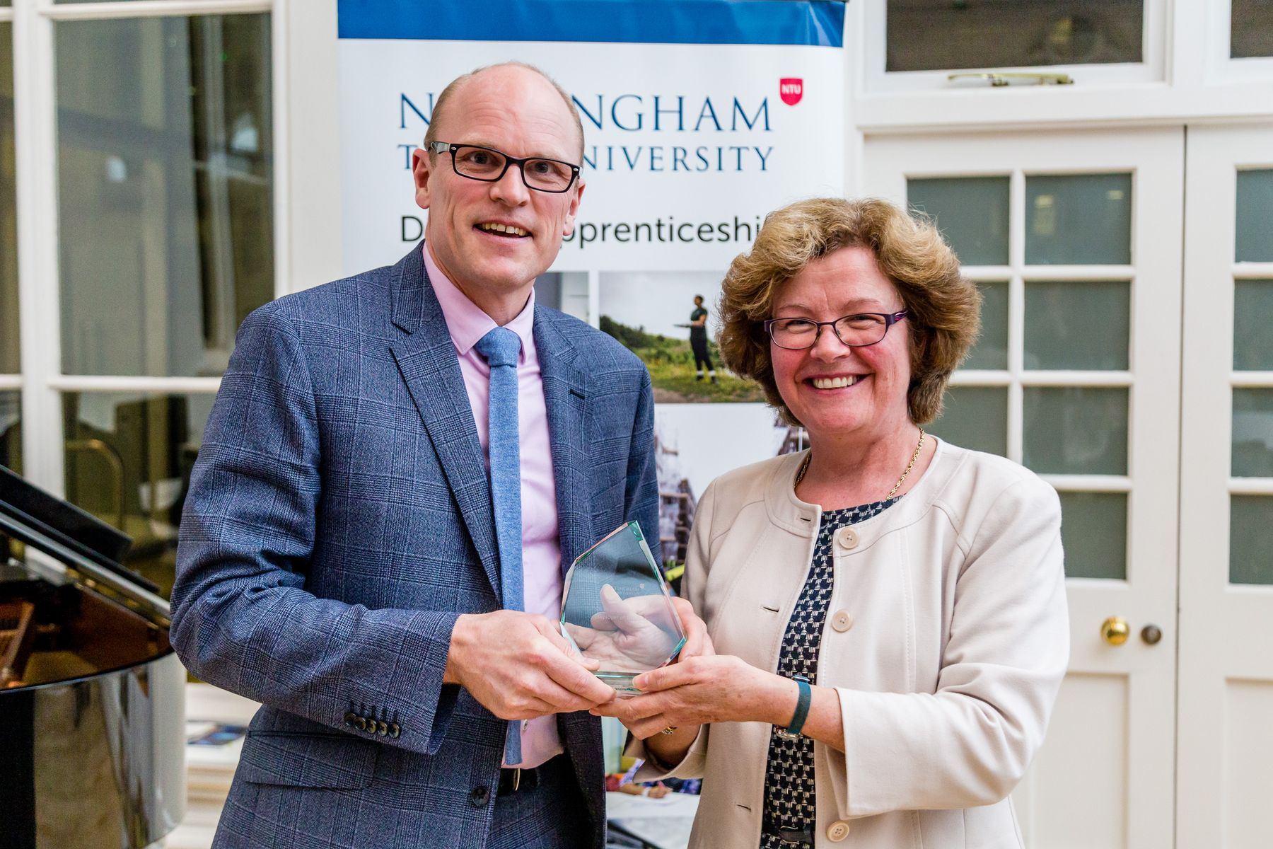 MJ Hillson accepting the award for small apprenticeship employer of the year