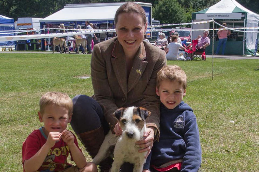 Woman with children and dog