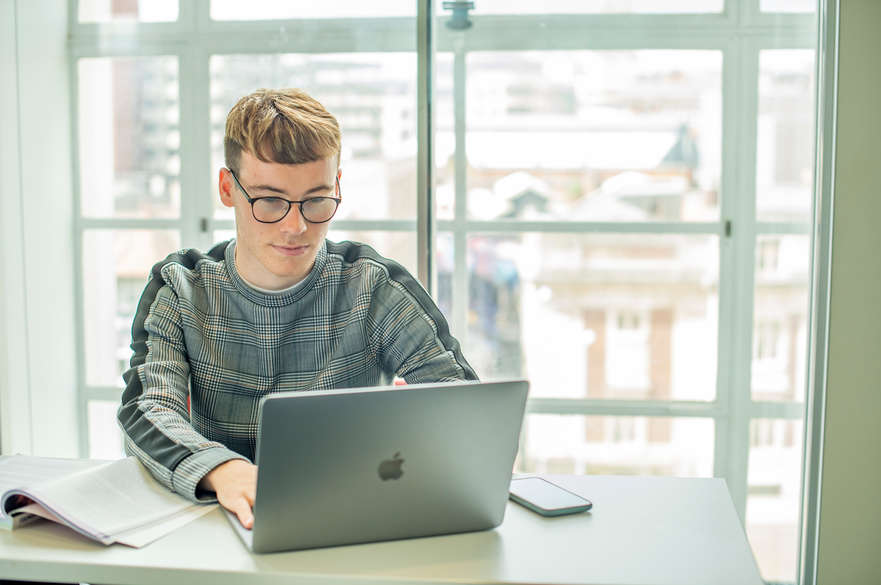 Student in a Newton seminar room