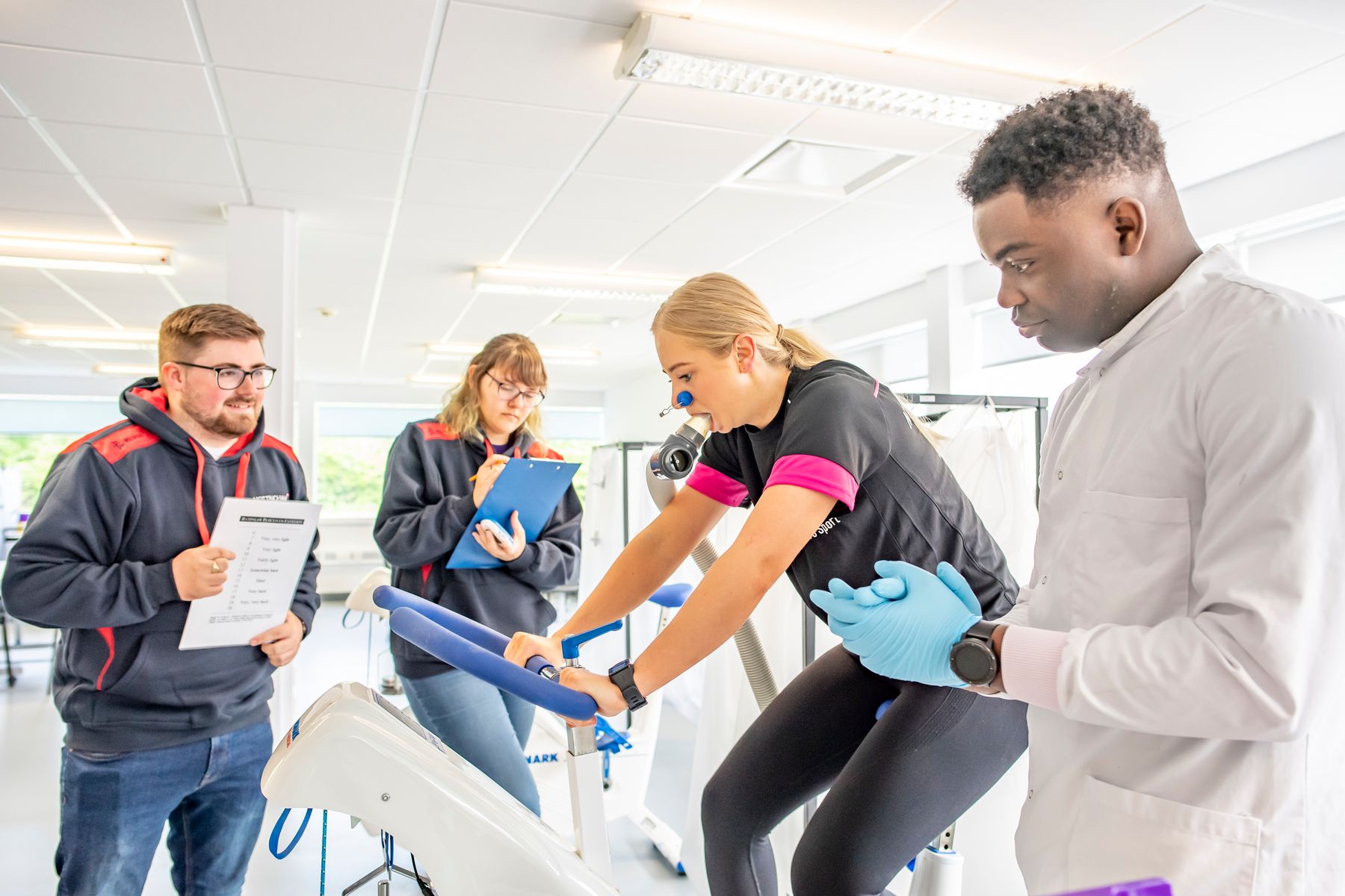 Sport science students working on a project