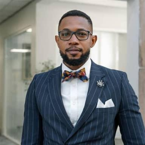 Man in suit with glasses