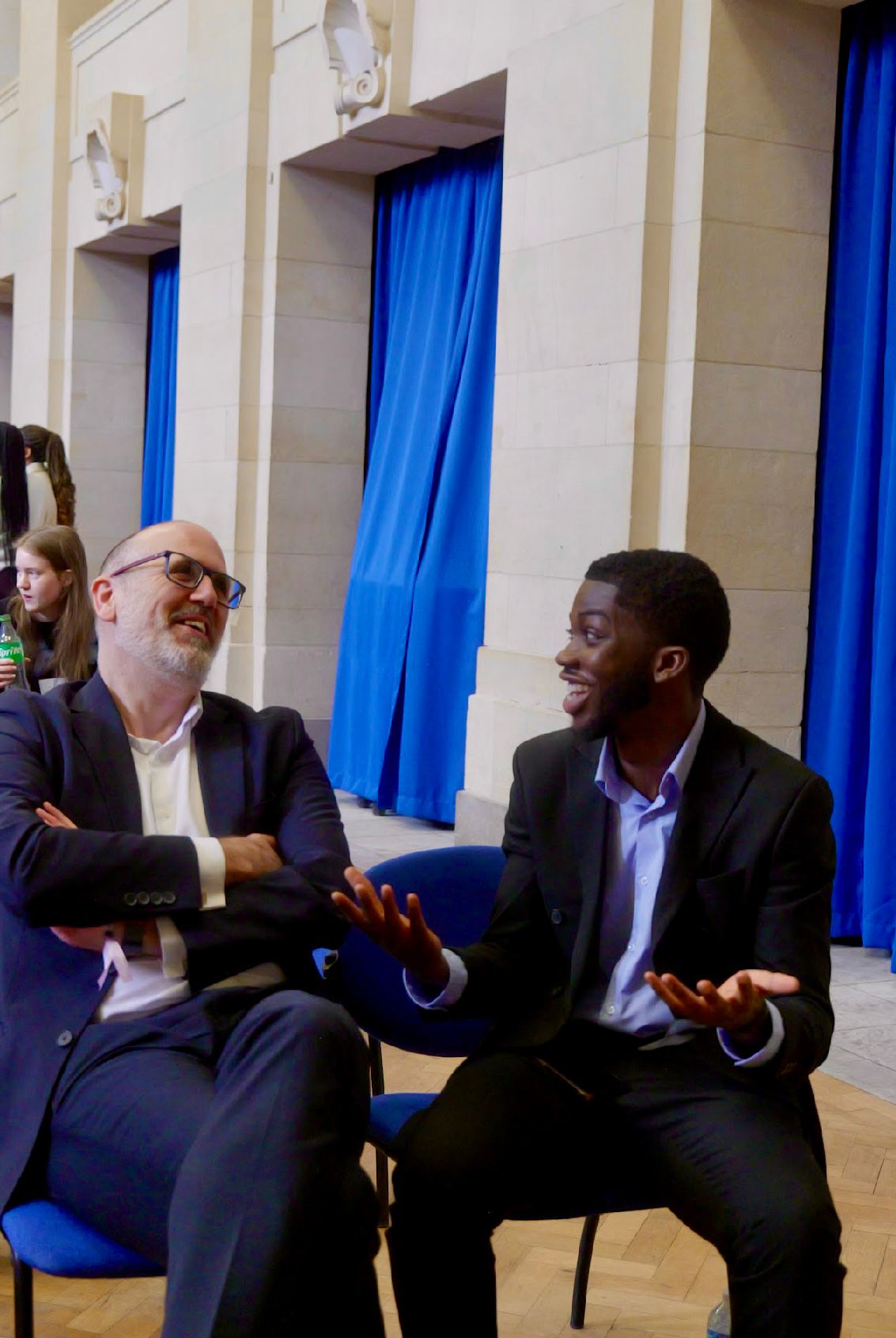 Matthew Homewood and NLS student talking