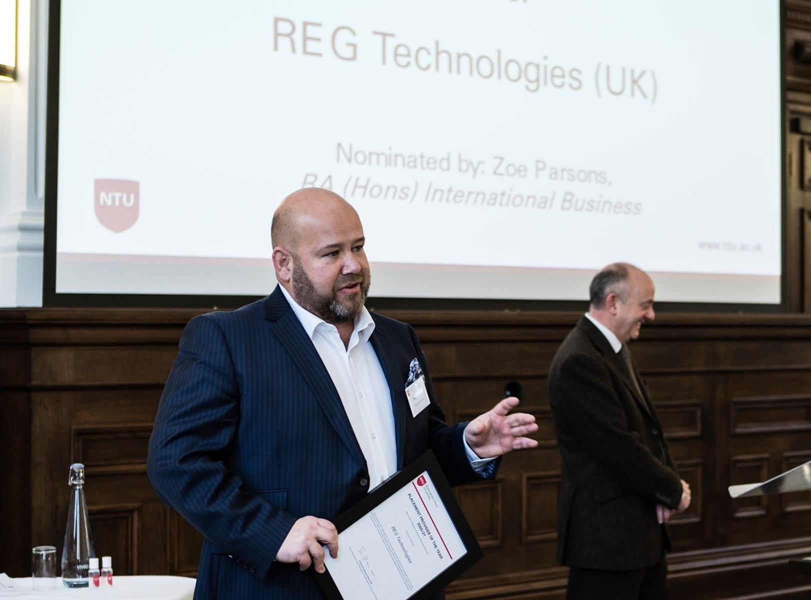 Paul Tasker accepting award for REG Technologies (UK)