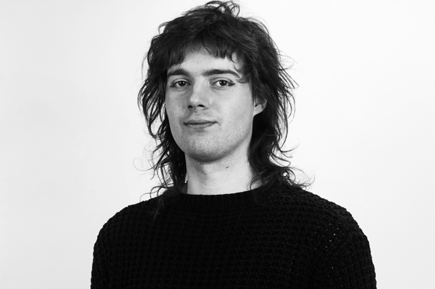 A person facing the camera for a photo.