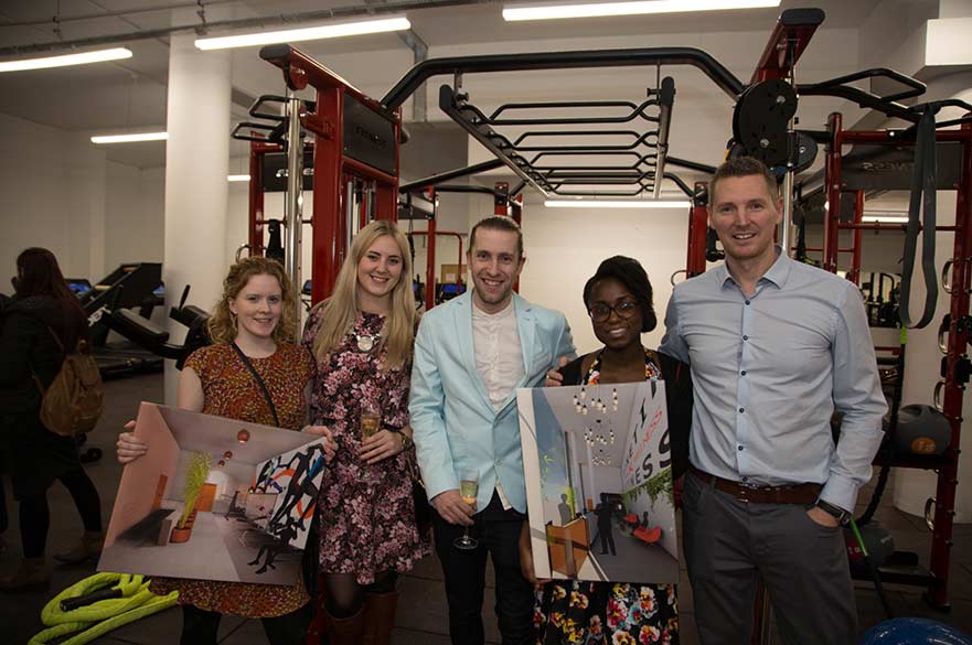 Students with designs and Kinetik Fitness owners