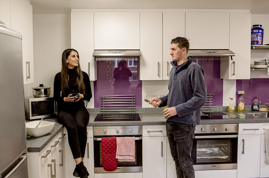 Students in Byron kitchen