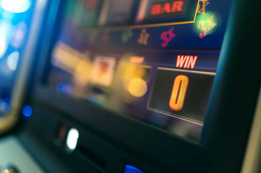 close up background of slot machine in casino club entertainment leisure concept