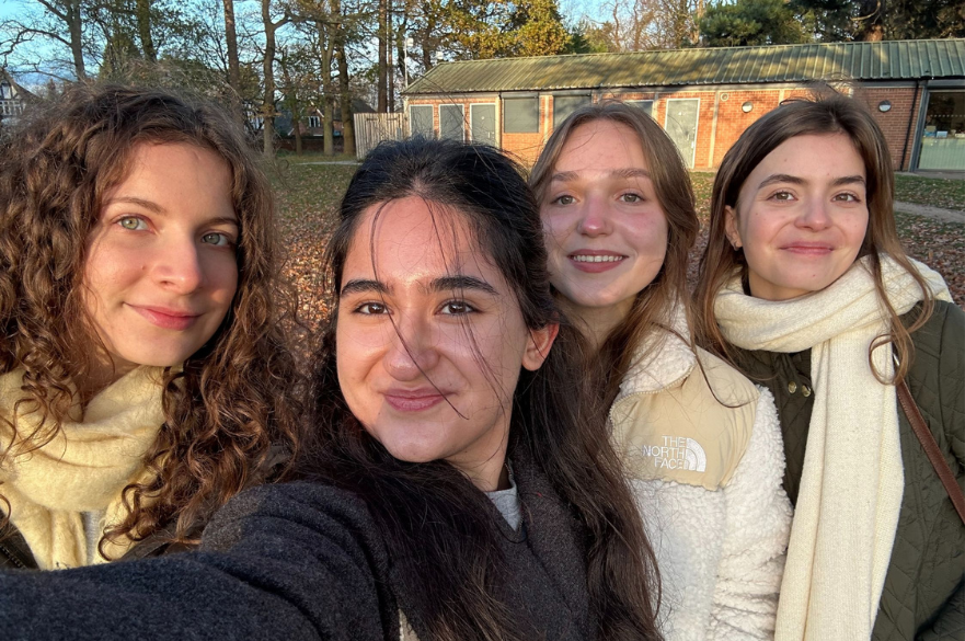 Selfie image of Deniz with friends