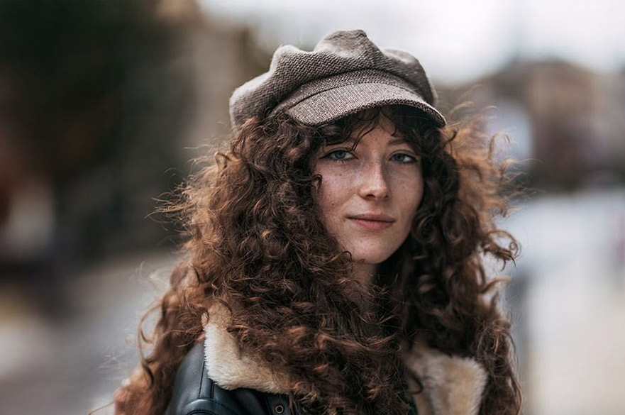 Student wearing a baker boy hat