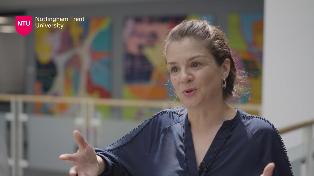 Chrissa Beaumont gesturing and talking off screen