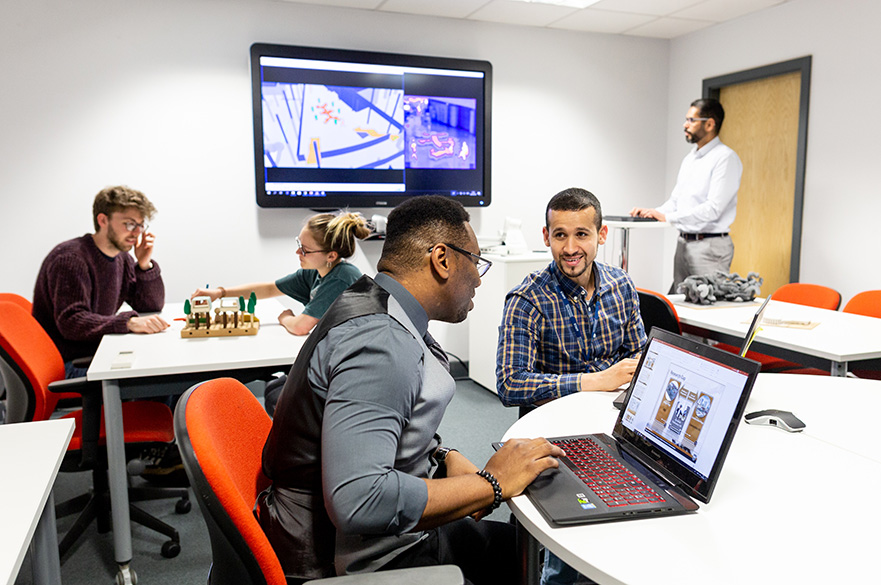 Academics and students working in the creative and virtual technologies research lab in the School of Architecture, Design and the Built Environment at Nottingham Trent University 
