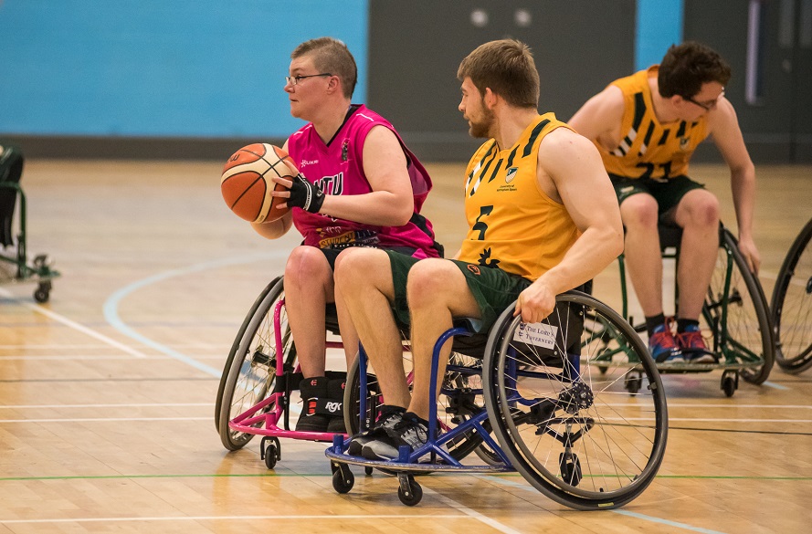 claire playing wheelchair basketball