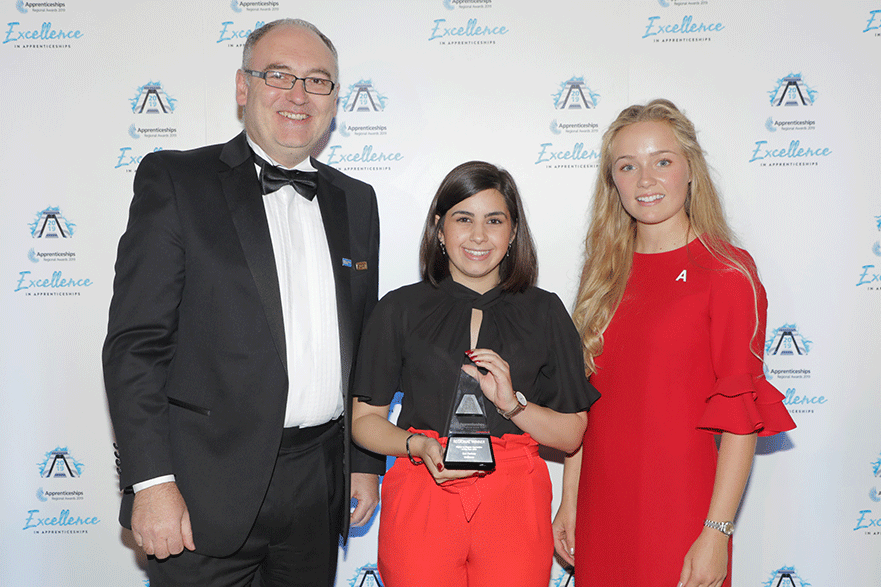 Kat Paricos collecting her award