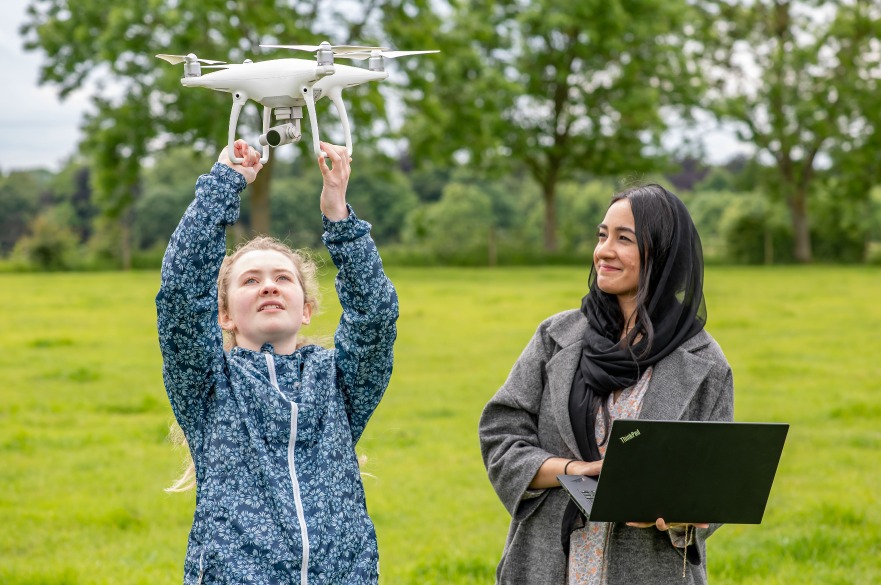 BSc Geography - Two students participate in a drone practical in our Outdoor Classroom