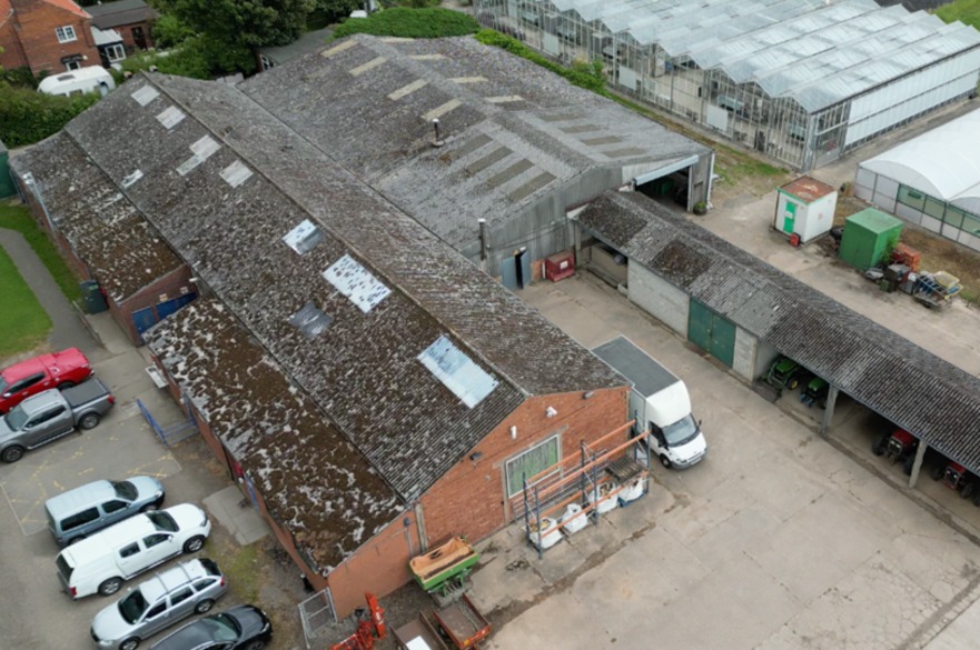 An aerial view of the existing Home Farm workshops
