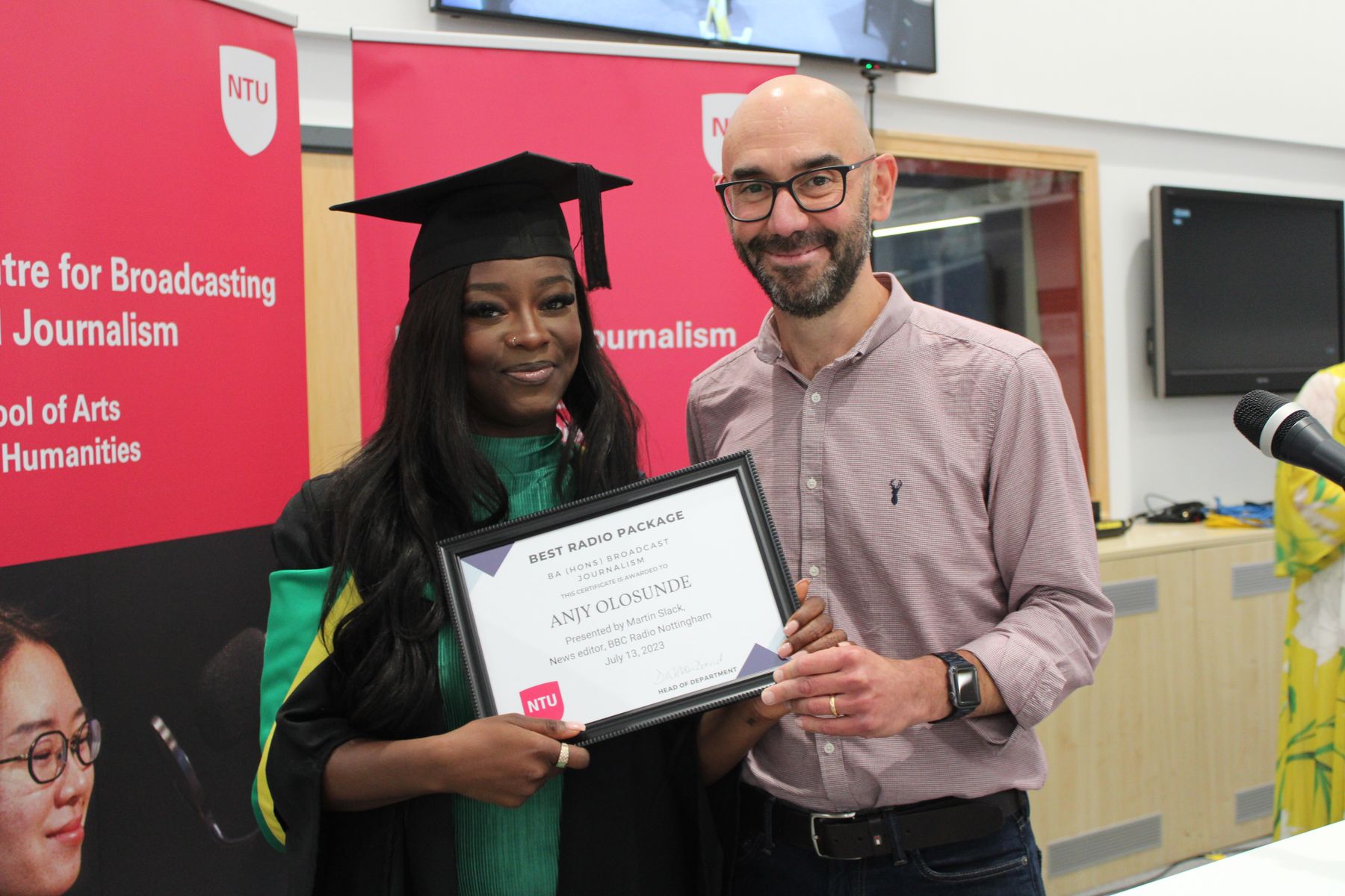 Martin Slack, BBC Radio Nottingham news editor, presenting to Anjy Olosunde