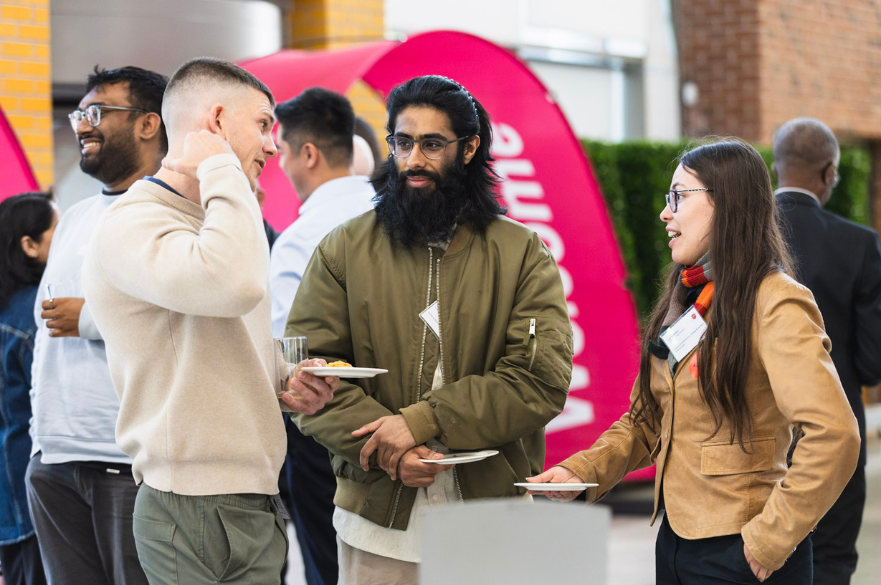 Leah Benjafield and Saad Muhammad networking at the AIFP celebration event 2026