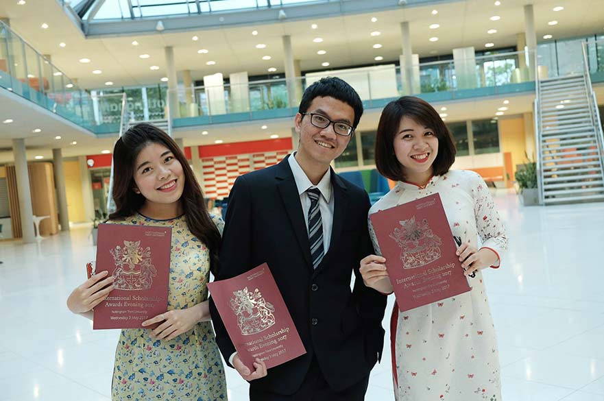 Students with scholarship certificates